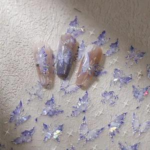 Holographic butterfly and star nail stickers for elegant almond shaped manicure art