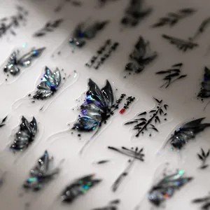 Laser butterfly and bamboo leaf nail art stickers with holographic finish on clear sheet