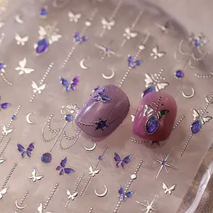3D butterfly and moon nail art stickers with metallic glitter and purple silver line design