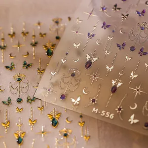 3D butterfly nail stickers M-556 with gold outlines and sparkling jewelry patterns
