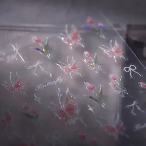 Pink tulip and laser butterfly nail art stickers with glitter effects on transparent film