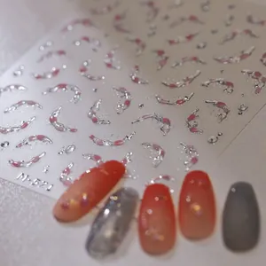 Detail of 3D gold stamping nail sticker M-571 with pink blush design and silver glitter