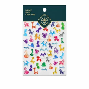 Colorful balloon dog nail art stickers with 3D gold accents and cute animal designs