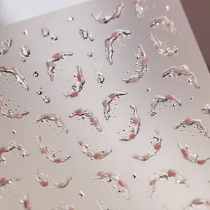 3D embossed nail stickers featuring silver stars, moons, and pink water drop patterns