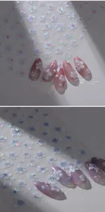 Macro view of M-576 holographic cherry blossom nail art stickers on pink manicured nails