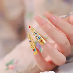 Luxurious Chinese palace style gold stiletto fake nails with blue floral hand-painted art