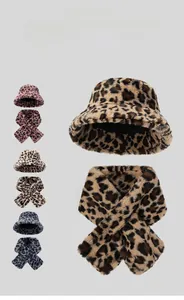 Detail of plush leopard print faux fur bucket hat and scarf set with heat retention texture
