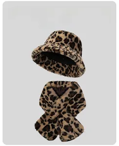 Close-up of winter leopard print bucket hat and plush neck warmer set in faux rabbit fur