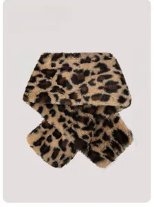 Close-up of leopard print faux fur scarf with soft plush texture and cross-wrap design