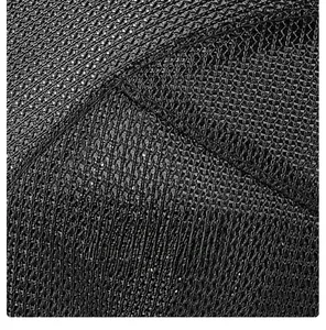 Close-up of breathable black mesh fabric texture on a vintage flat cap detail