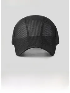 Close-up of black breathable mesh fabric showing moisture-wicking texture on ivy cap