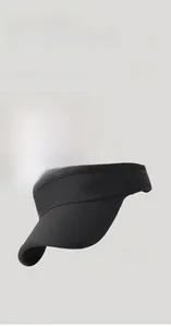 Close-up of lightweight black visor hat featuring breathable honeycomb mesh side panels