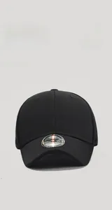 Front detail of a black short brim baseball cap with a size sticker and hard top structure