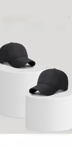 Detail view of quick-dry black baseball cap showing breathable moisture-wicking fabric texture
