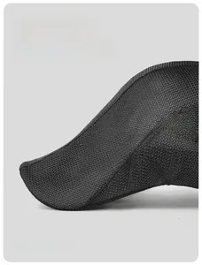 Detail view of the long brim on a breathable mesh ivy cap for sun protection