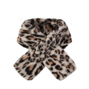 Chic leopard print faux fur cross scarf for winter warmth with soft plush texture