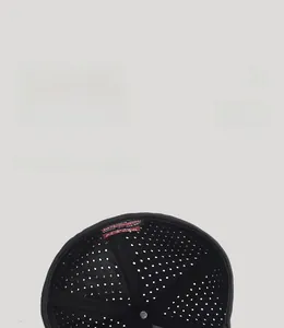 Detail view of the breathable mesh lining and brand label inside the black baseball cap