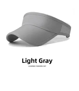 Close-up of light grey running visor showing breathable mesh fabric and sporty texture