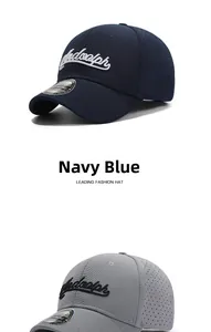 Detail of laser-cut ventilation holes and embroidery on navy blue baseball cap
