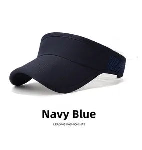 Close-up of navy blue visor hat featuring breathable mesh panels and textured fabric