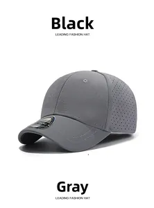 Detail view of grey short brim baseball cap with laser-cut breathability holes