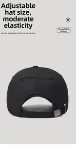 Adjustable back strap with silver metal buckle on a black waterproof baseball cap