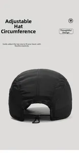 Close-up of adjustable elastic bungee cord on black waterproof baseball cap