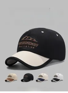 Close-up of cotton baseball cap featuring short brim design and mountain pattern embroidery