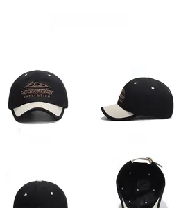 Detail view of cotton baseball cap showing mountain embroidery and metal buckle closure