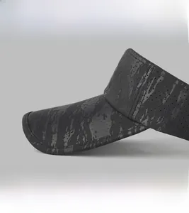 Detail showing grey sun visor with subtle floral texture and breathable mesh material