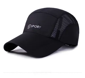 Detail of breathable gray honeycomb mesh and SPORT logo on black quick-dry athletic cap