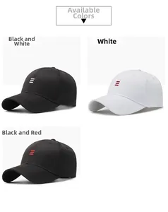 Three embroidered baseball caps in black and white with classic curved brims