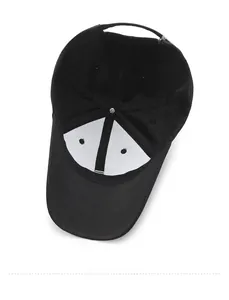 Detailed view of the black baseball cap interior with breathable mesh and adjustable strap
