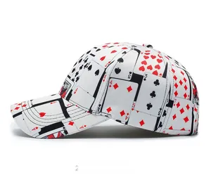 Side view of white baseball cap featuring all-over red and black poker card pattern print