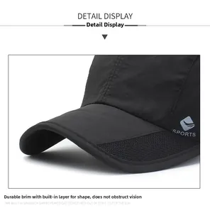 Détail de la casquette sport noire avec maille respirante et visière rigide