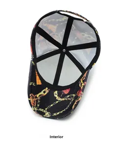 Internal view of a baseball cap showing breathable mesh lining and gold chain print