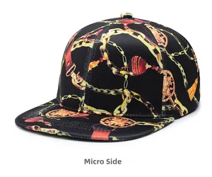 Side view of flat brim hip hop hat with gold baroque chain print and coin patterns