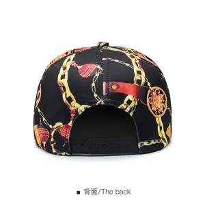 Detail view of the snapback closure on a black baroque print hip hop flat brim cap