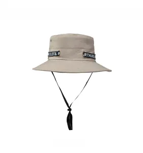 Front view of khaki outdoor sun hat with decorative black strap and adjustable wind rope