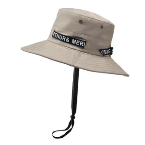 Khaki outdoor bucket hat with adjustable windproof cord and breathable metal eyelets
