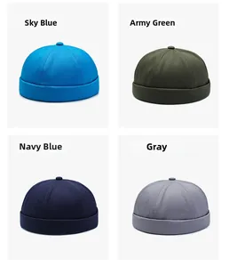 Detail view of cotton docker hats in sky blue, army green, navy blue and grey colors