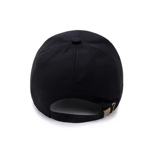 Classic black cotton baseball cap with adjustable bronze metal buckle back view