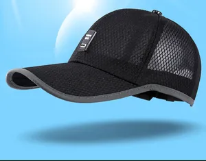 Detail of breathable honeycomb mesh fabric on back of black sports baseball cap
