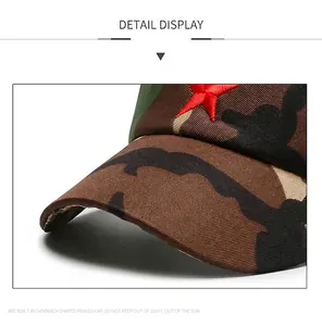 Detailed view of red star embroidery and camo fabric on kids outdoor sun visor hat