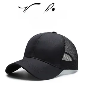 Detailed close-up of breathable mesh back and stitching on a black sports baseball cap