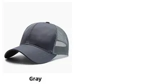 Detail view of the breathable mesh back and curved brim on a grey baseball cap