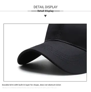 Detail of sturdy curved brim on black baseball cap with breathable mesh texture