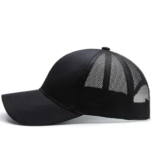 Minimalist black mesh trucker baseball cap for outdoor sun protection shown in side view