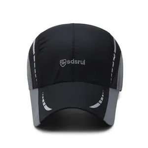 Casquette de sport noire séchage rapide avec panneaux gris et bandes réfléchissantes