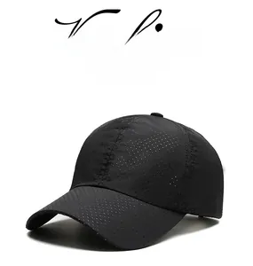 Detail of laser-cut ventilation holes on lightweight quick-dry black baseball cap